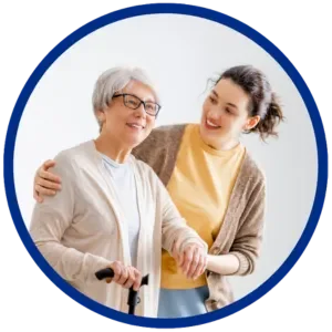 Team member assisting a Resident with her walker